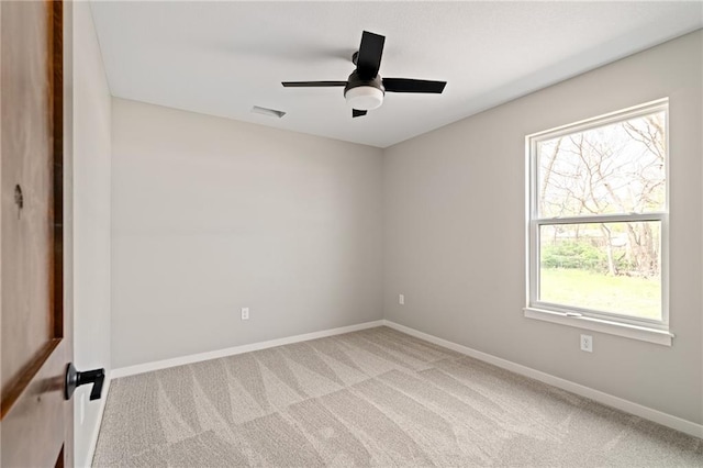 607 W Dryden St, Odessa, MO 64076 - unfurnished room with carpet, baseboards, and a healthy amount of sunlight