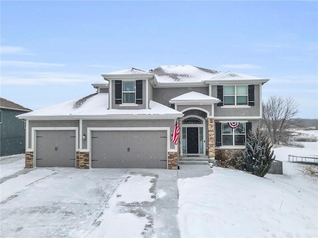 view of front of home with a garage