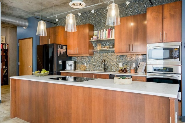 kitchen with stainless steel appliances, a sink, light countertops, decorative backsplash, and open shelves