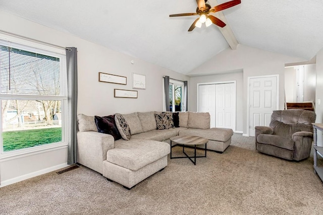 living area featuring lofted ceiling with beams, carpet floors, a ceiling fan, and baseboards