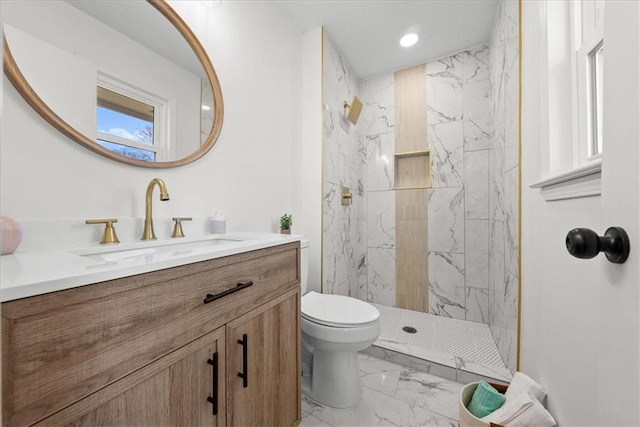 full bathroom with toilet, recessed lighting, vanity, marble finish floor, and a marble finish shower