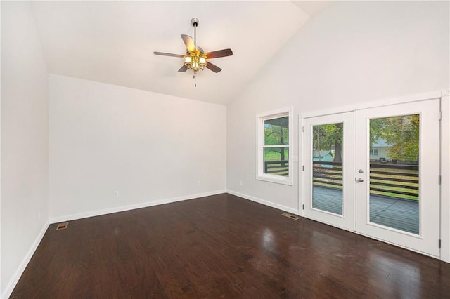 unfurnished room featuring ceiling fan, high vaulted ceiling, dark hardwood / wood-style floors, and french doors