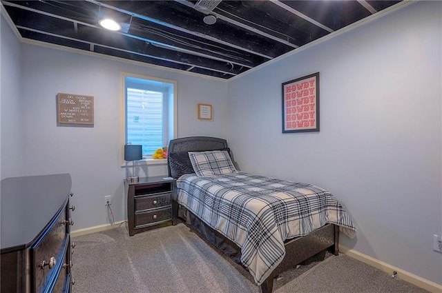 carpeted bedroom with baseboards