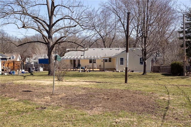 view of yard featuring a patio area and fence