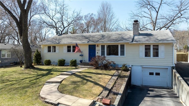 ranch-style house with a front lawn, an attached garage, fence, and a chimney