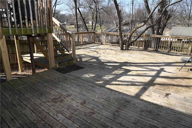 wooden deck featuring stairway