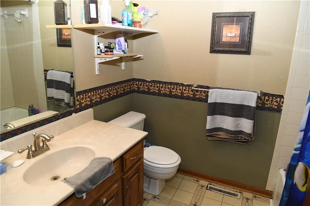 bathroom featuring a shower with shower curtain, visible vents, toilet, and vanity