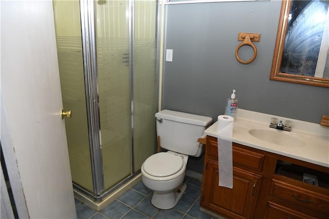 full bathroom featuring tile patterned flooring, a stall shower, toilet, and vanity