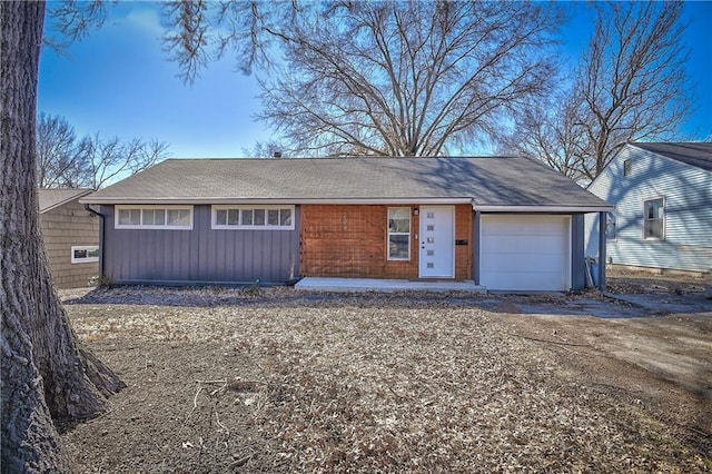 view of front of house with a garage and driveway