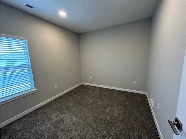 view of carpeted spare room