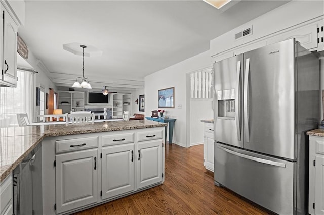 kitchen featuring white cabinetry, ceiling fan, visible vents, and stainless steel refrigerator with ice dispenser