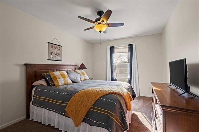 bedroom with carpet, a ceiling fan, and baseboards