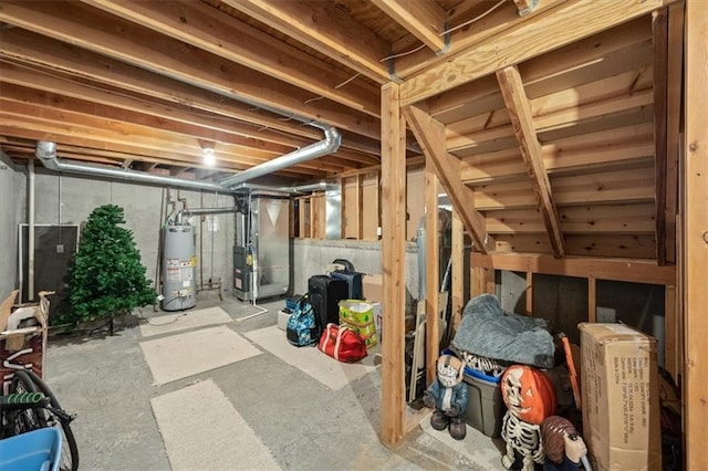 unfinished basement with water heater and heating unit