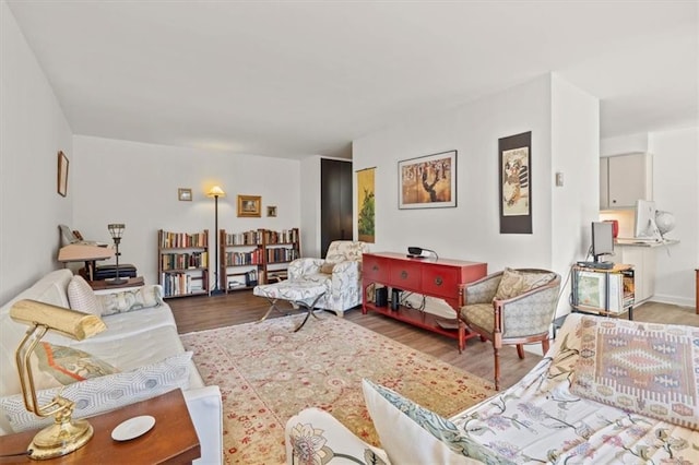 living area with wood finished floors