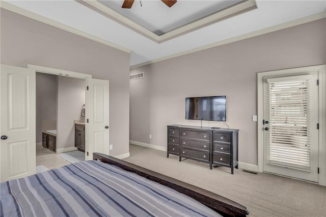 carpeted bedroom with access to exterior, a tray ceiling, crown molding, visible vents, and baseboards