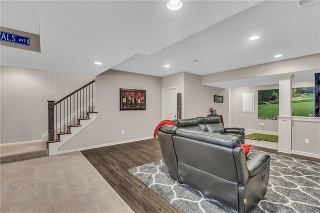 living area featuring stairs, baseboards, wood finished floors, and recessed lighting