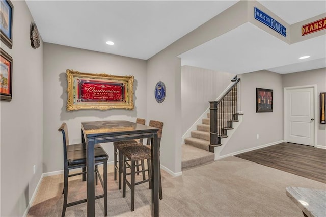 dining space with stairs, carpet floors, recessed lighting, and baseboards