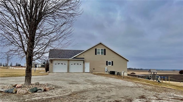 view of home's exterior with a garage