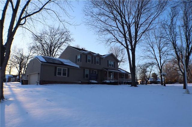 view of front of property with roof mounted solar panels