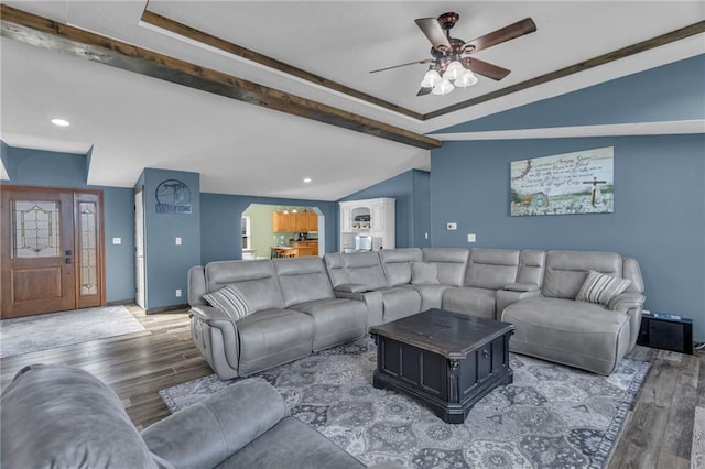 living room with vaulted ceiling with beams, wood finished floors, a ceiling fan, and recessed lighting