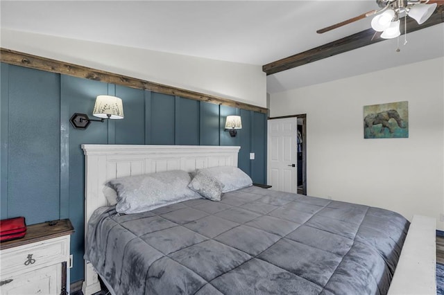 bedroom featuring lofted ceiling with beams and ceiling fan