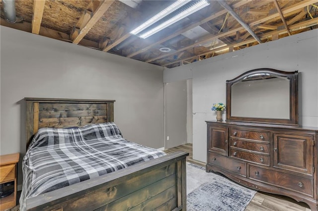 bedroom featuring light wood-type flooring