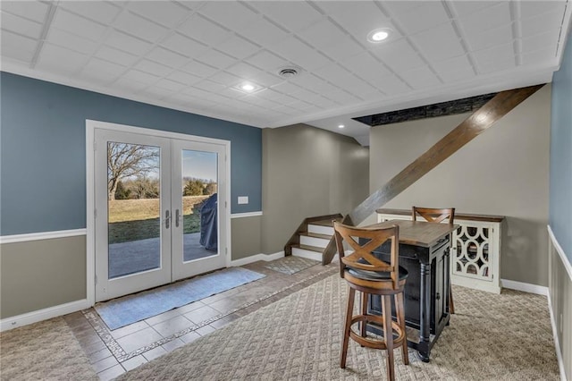 interior space featuring recessed lighting, french doors, stairway, and baseboards