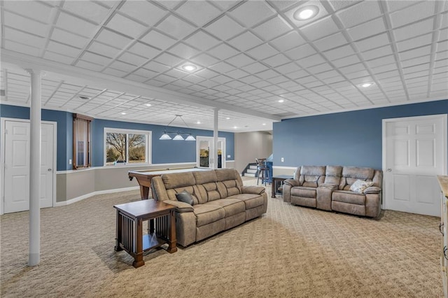 living room with carpet floors, recessed lighting, and baseboards