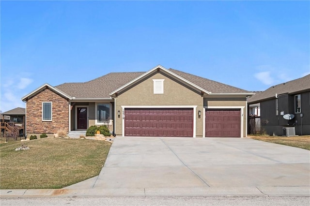 single story home with cooling unit, an attached garage, stucco siding, a front lawn, and concrete driveway