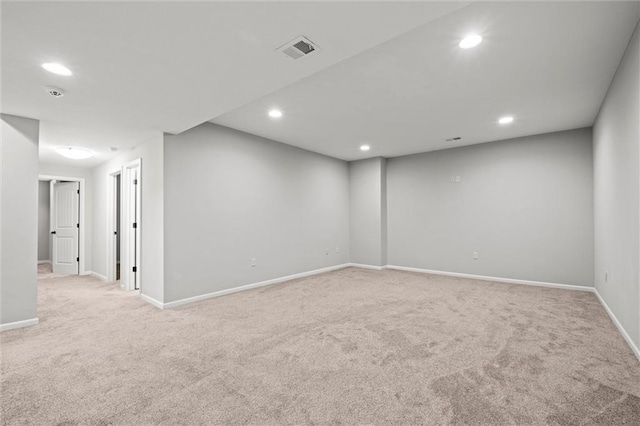 interior space featuring recessed lighting, visible vents, and baseboards