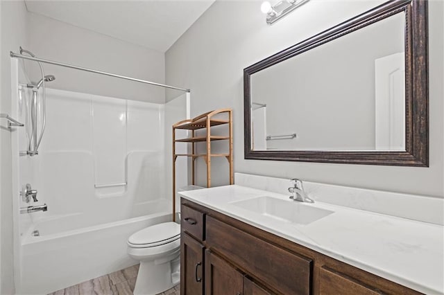 full bathroom featuring toilet, vanity, and bathing tub / shower combination