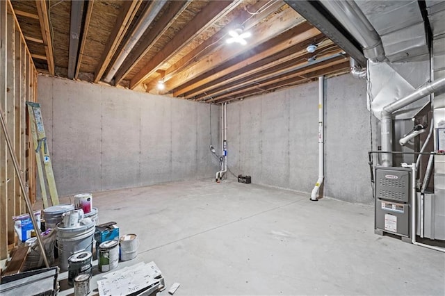 unfinished basement with heating unit