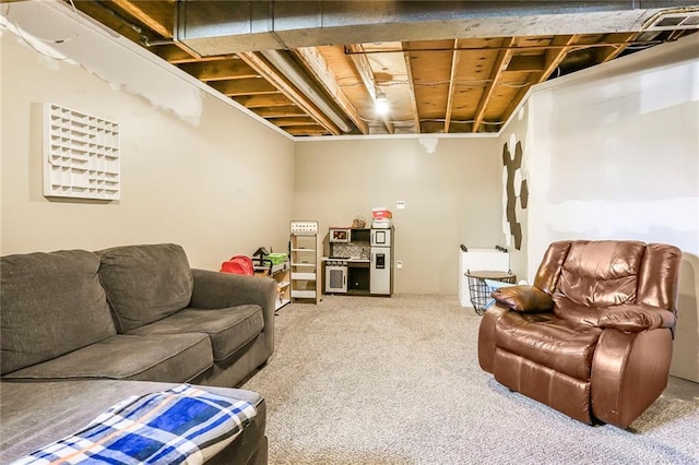 living area featuring carpet