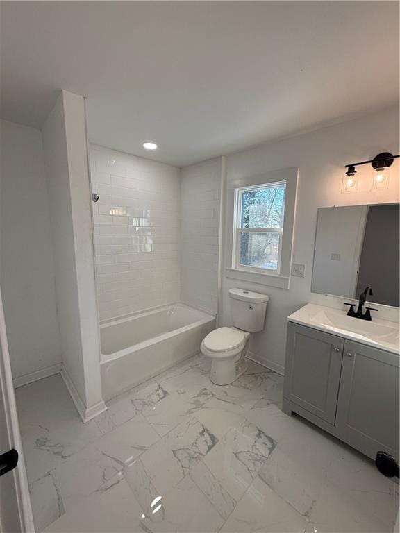 bathroom with shower / bath combination, baseboards, toilet, marble finish floor, and vanity