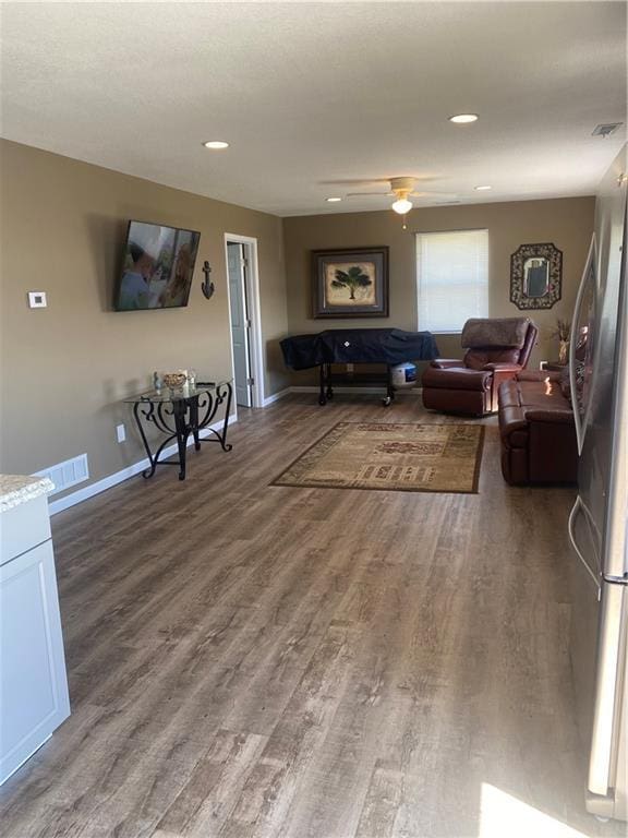 200 Ramsey Dr, Craig, MO 64437 - living room with a ceiling fan, visible vents, and wood finished floors