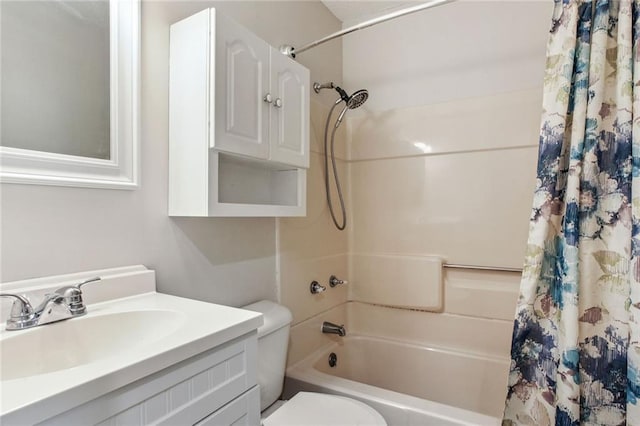 full bathroom featuring shower / tub combo, vanity, and toilet