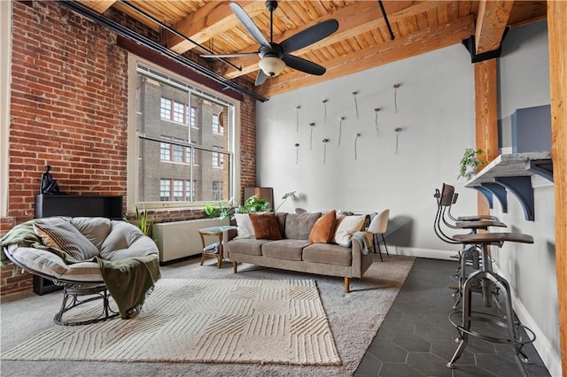 interior space featuring wood ceiling, beam ceiling, and ceiling fan