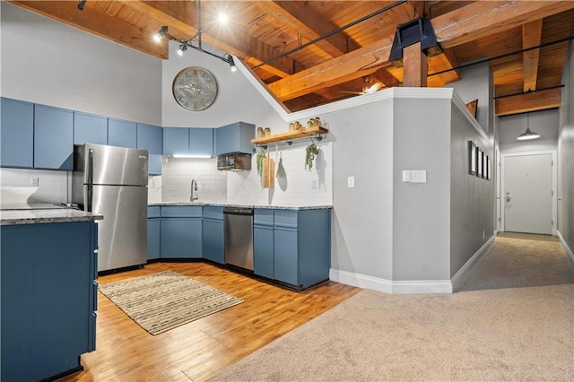 kitchen featuring wooden ceiling, blue cabinetry, appliances with stainless steel finishes, and light countertops