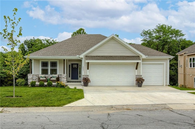 view of front of home featuring a garage, driveway, roof with shingles, covered porch, and a front lawn