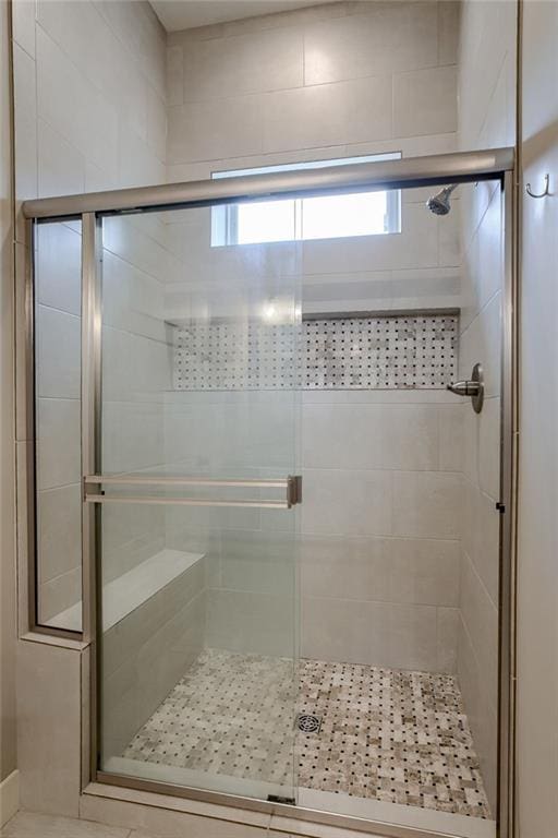 full bath featuring a stall shower