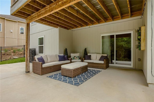 view of patio with fence and an outdoor living space