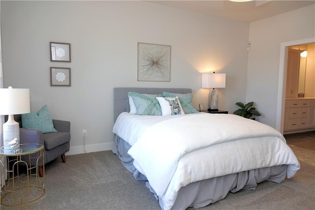 carpeted bedroom featuring baseboards