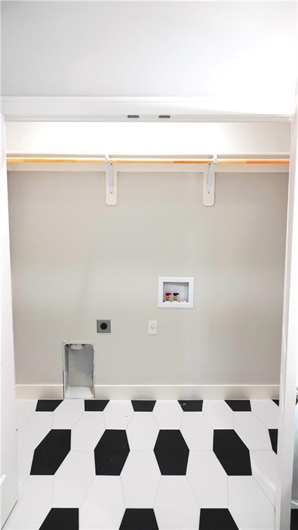 laundry area featuring washer hookup, laundry area, hookup for an electric dryer, and baseboards