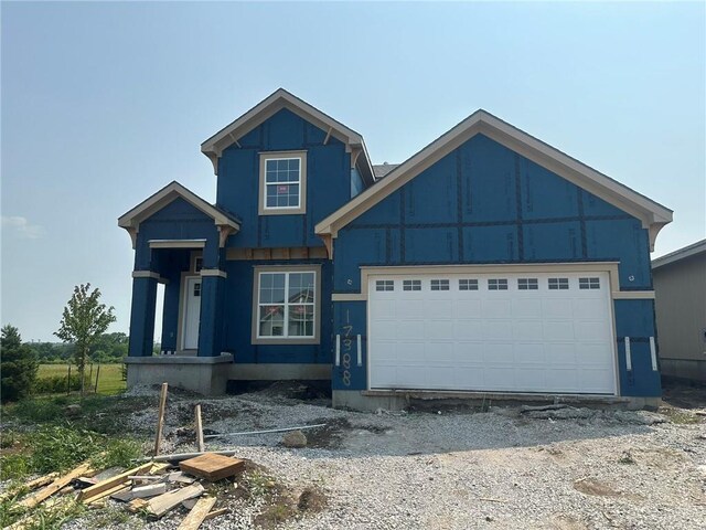 17388 S Kaw St, Olathe, KS 66062 - view of front of property featuring a garage and board and batten siding