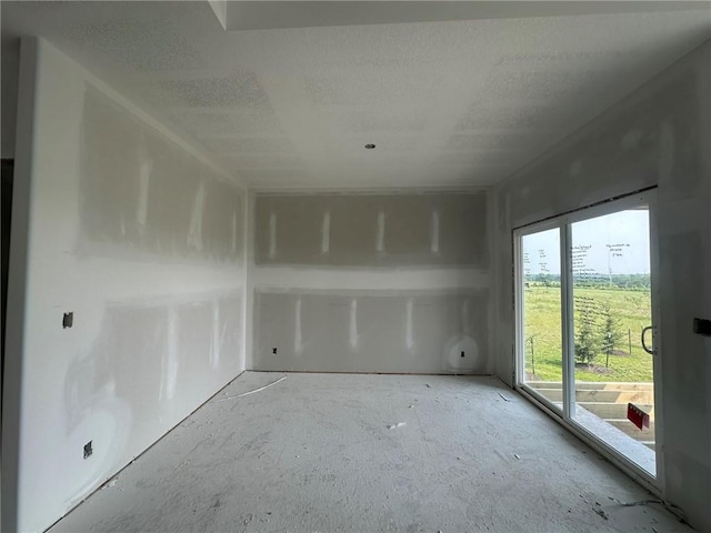 17388 S Kaw St, Olathe, KS 66062 - spare room featuring a textured ceiling