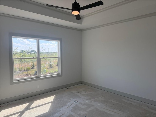 17388 S Kaw St, Olathe, KS 66062 - empty room with healthy amount of natural light, ceiling fan, and a tray ceiling