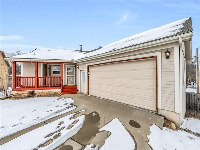 single story home with a garage, fence, and a porch