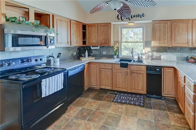 kitchen featuring open shelves, lofted ceiling, decorative backsplash, black appliances, and a sink