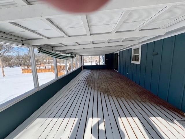 view of snow covered deck