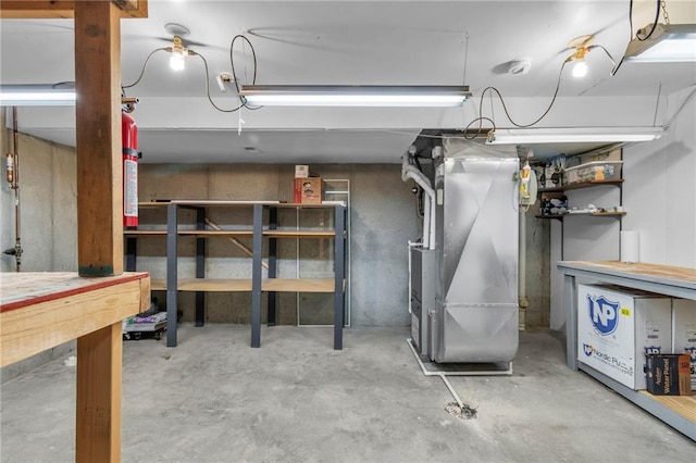 basement featuring heating unit